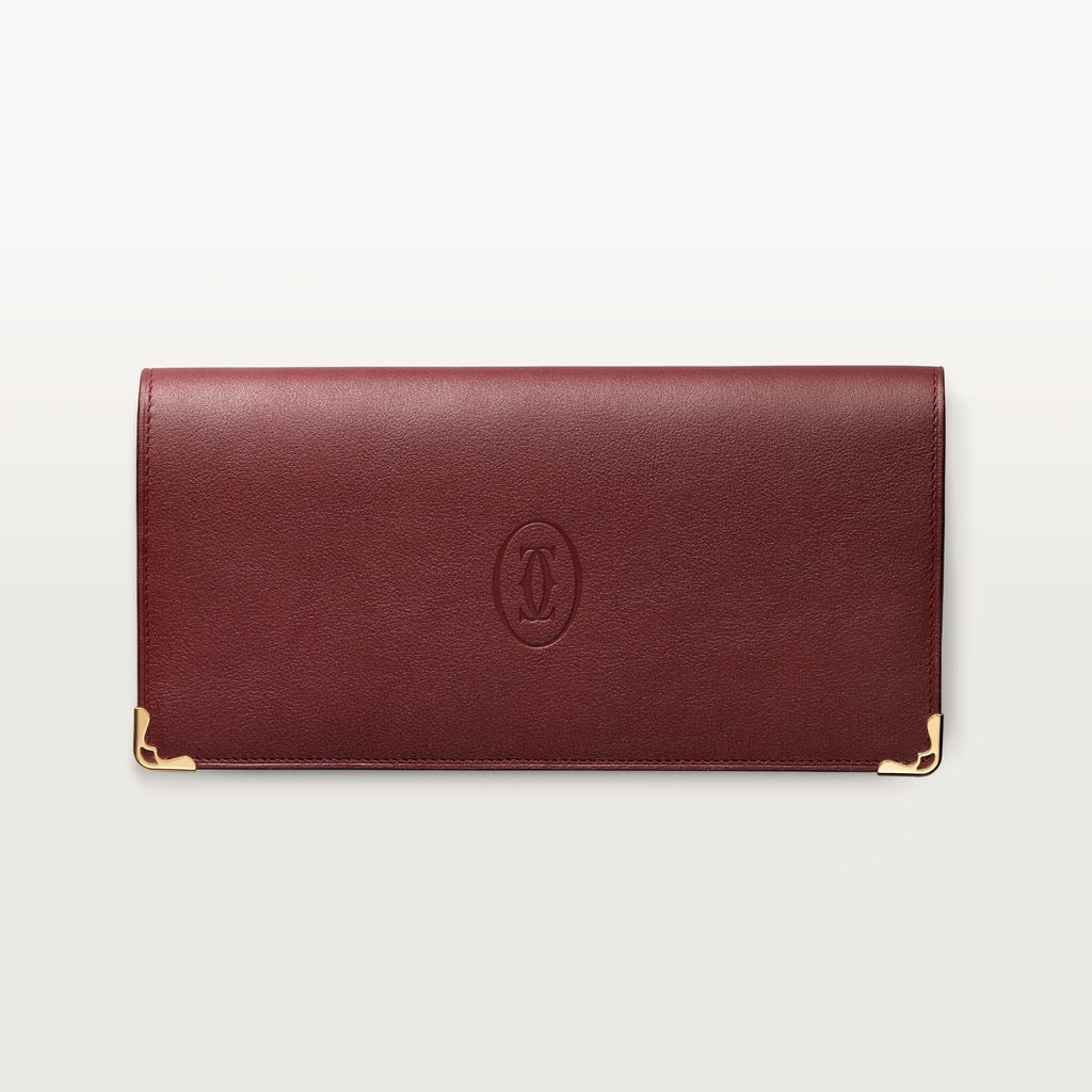 International Wallet with Gussets, Must de CartierBurgundy calfskin, golden finish