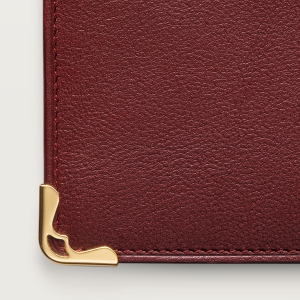 Zipped International Wallet, Must de Cartier Burgundy calfskin, golden finish