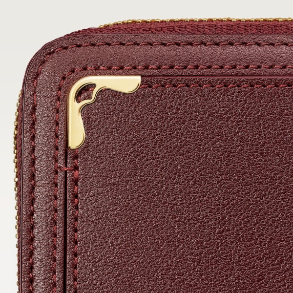 Zipped International Wallet, Must de Cartier Burgundy calfskin, golden finish