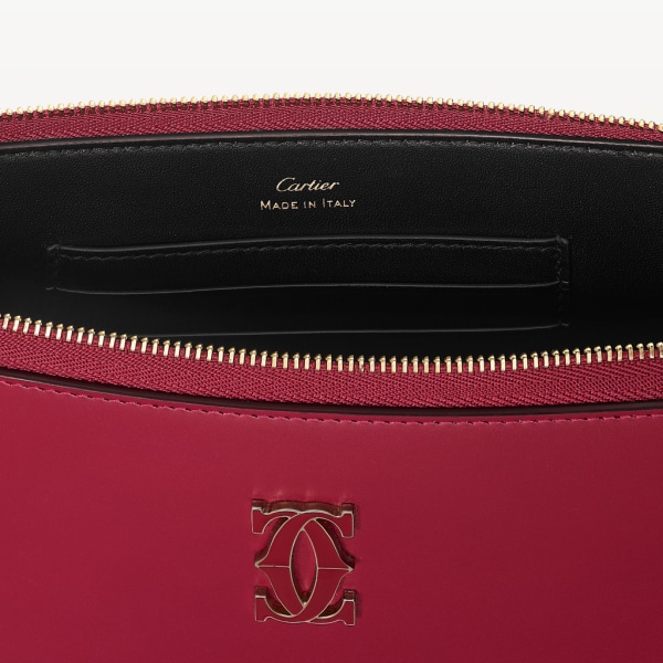 Pouch small model, C de Cartier Cherry red calfskin, golden finish and cherry red enamel