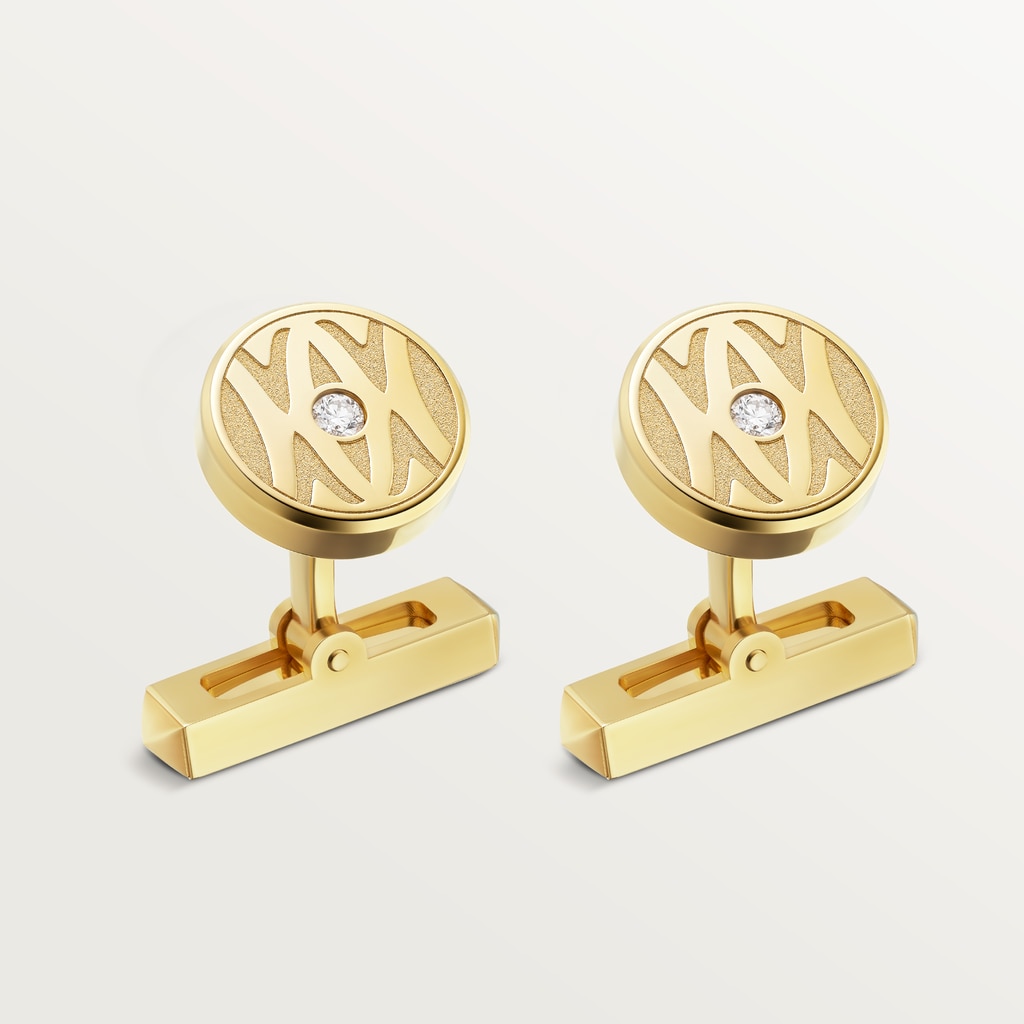 Cufflinks with gold C de Cartier logo.Yellow gold, brilliant-cut diamonds.