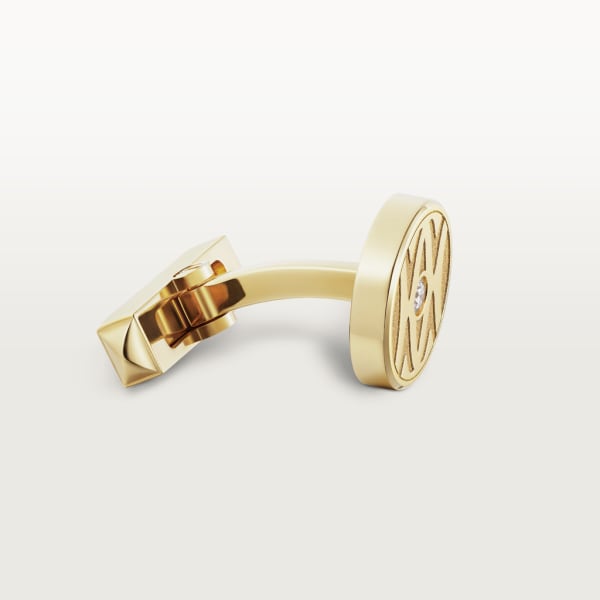 Cufflinks with gold C de Cartier logo. Yellow gold, brilliant-cut diamonds.