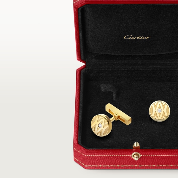 Cufflinks with gold C de Cartier logo. Yellow gold, brilliant-cut diamonds.