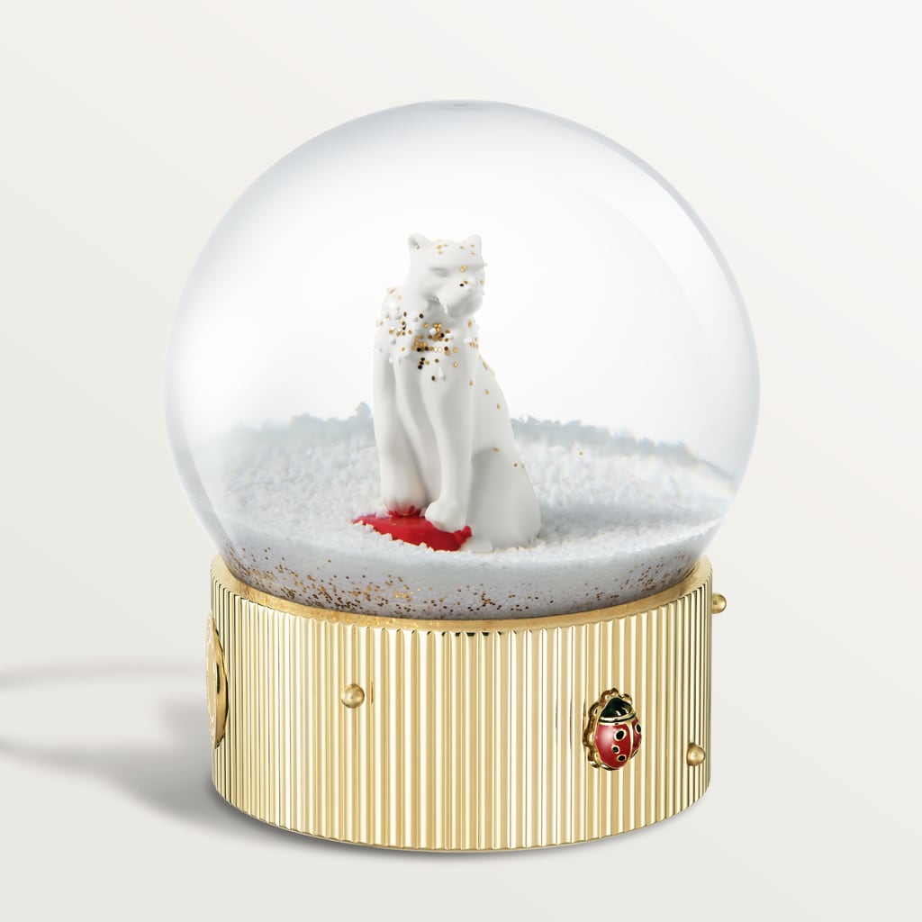 Diabolo de Cartier snow globeGlass, lacquered gold-finish metal