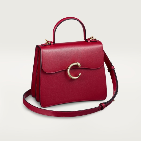 Top handle bag small model, Panthère de Cartier Cherry red calfskin, golden finish