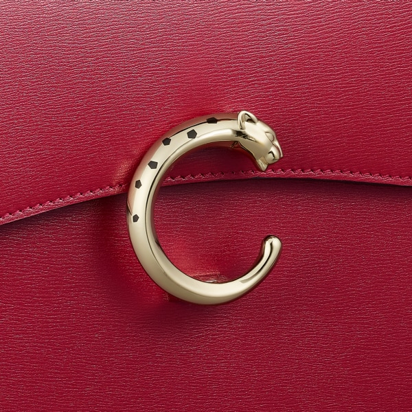 Top handle bag small model, Panthère de Cartier Cherry red calfskin, golden finish