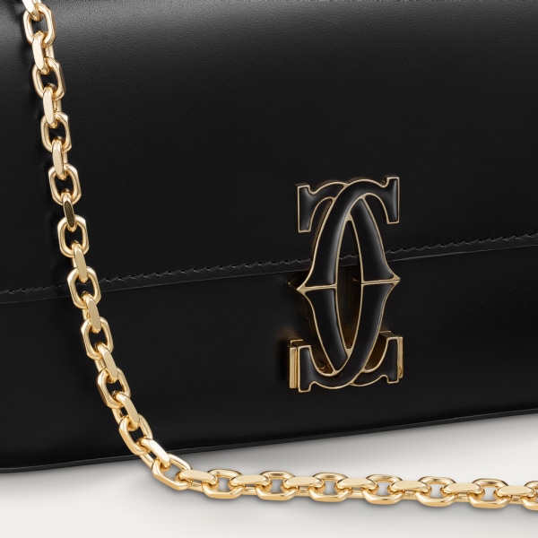 Mini model chain bag, C de Cartier Black calfskin, gold and black enamel finish