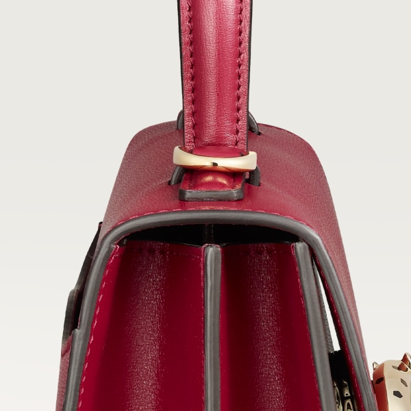 Top handle bag small model, Panthère de Cartier Cherry red calfskin, golden finish