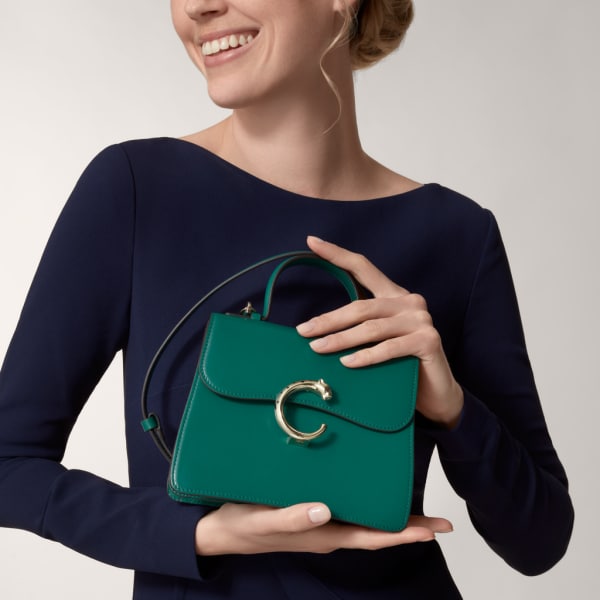 Top handle bag mini model, Panthère de Cartier Dark green calfskin, golden finish