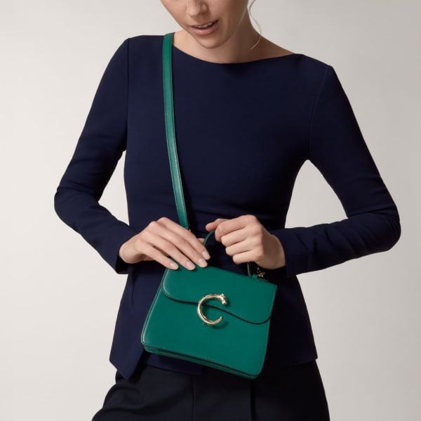 Top handle bag mini model, Panthère de Cartier Dark green calfskin, golden finish