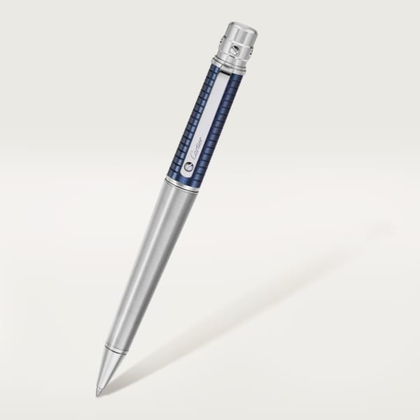 Santos de Cartier ballpoint pen Large model, brushed and engraved striated metal covered with blue PVD, palladium finish