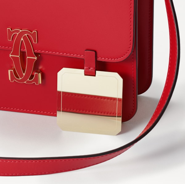 Mini shoulder bag, C de Cartier Red calfskin, golden finish and red enamel