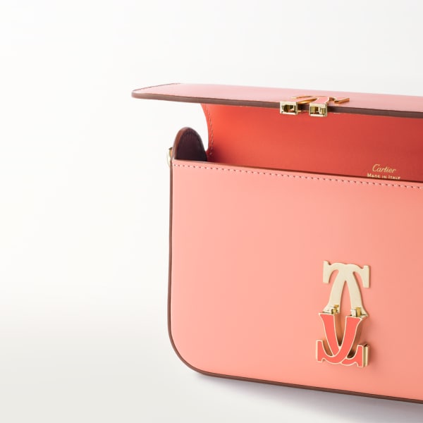 Mini chain bag, C de Cartier Two-tone coral/light coral calfskin, golden finish and coral enamel