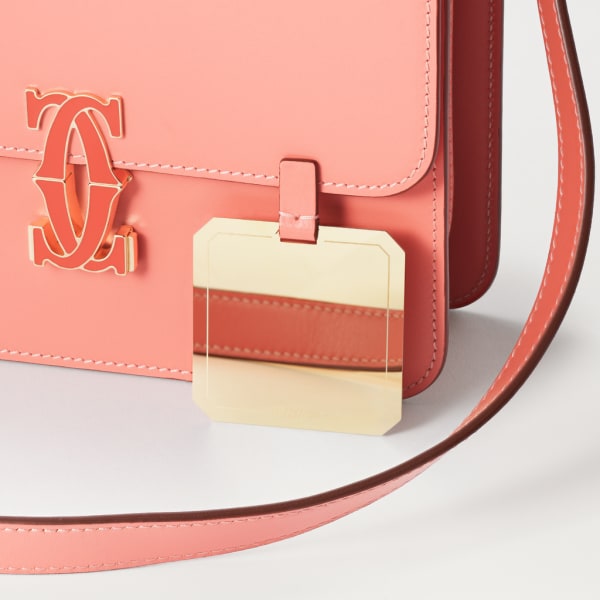 Mini shoulder bag, C de Cartier Two-tone coral/light coral calfskin, palladium finish and coral enamel